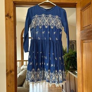 NWOT TOPSHOP long sleeve blue dress with white embroidery. Skirt is lined.